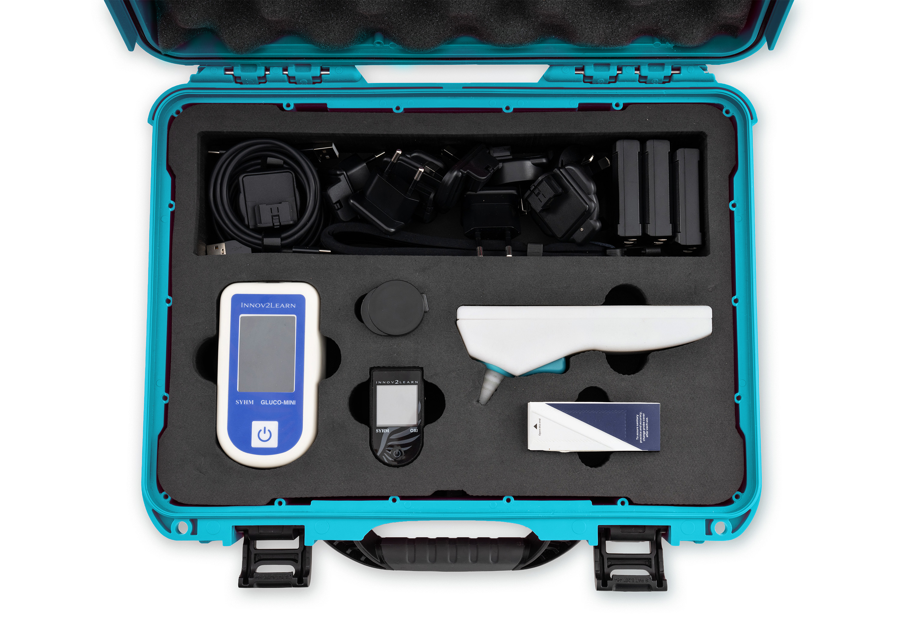Valigetta Euro Kit turchese aperta: Gluco-mini, Oxi, Ear-T, coprisonda, strisce e caricatori, ognuno nel proprio alloggiamento di schiuma tagliata al laser